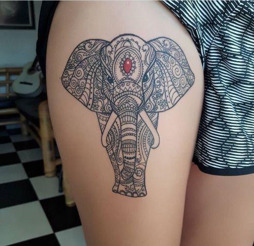 Tribal elephant tattoo outline with a red ruby on head