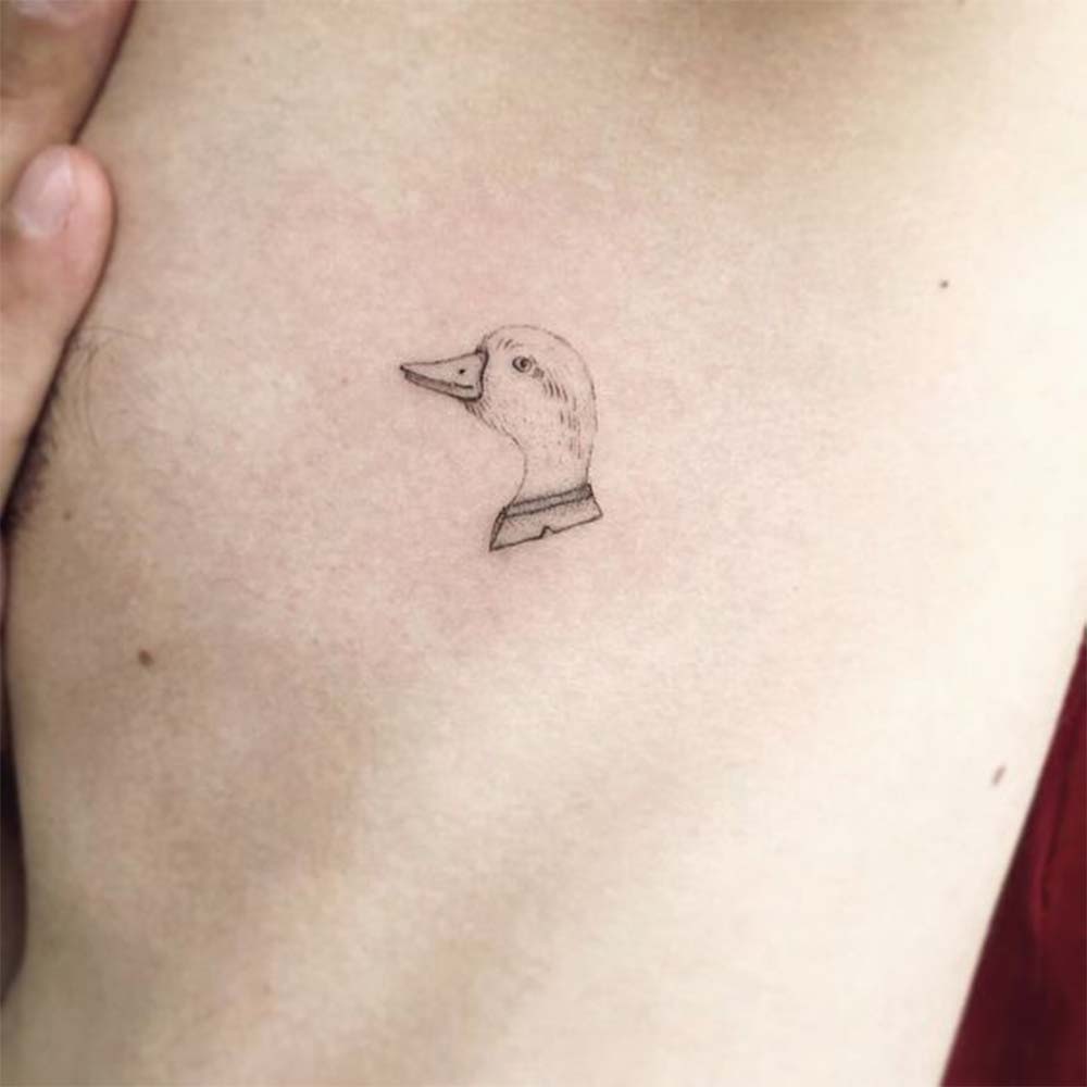 simple duck head small tattoo