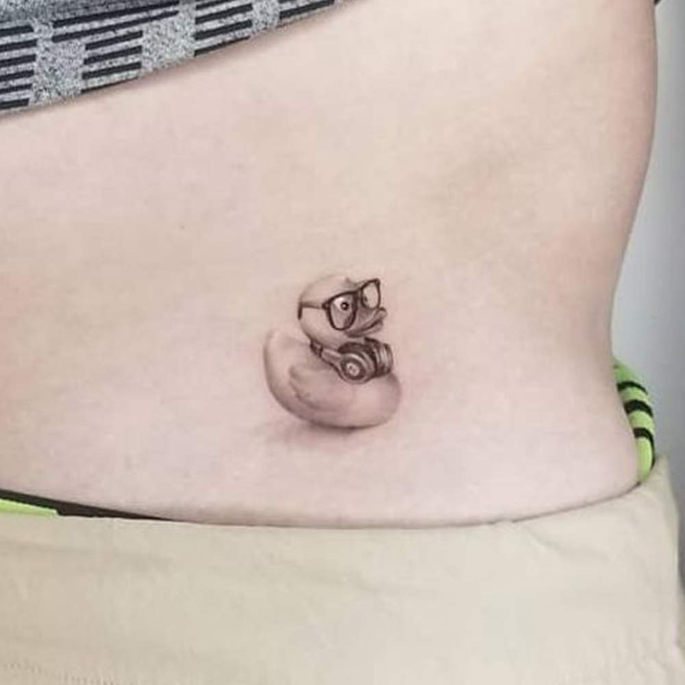 funny rubber duck tattoo on hip