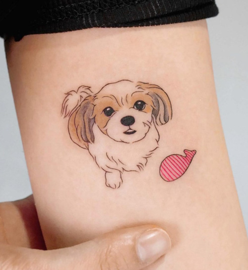 simple outline of dog tattoo looking up
