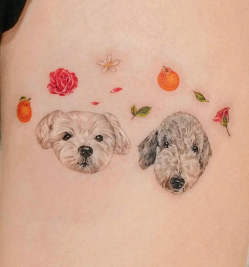 two dog portrait tattoos